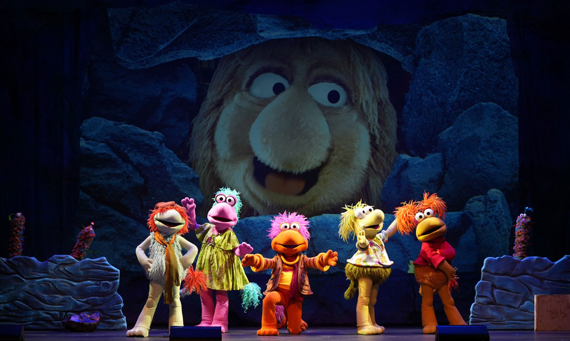 Families smile and laugh as the Fraggles embark on a lively adventure filled with catchy songs, whimsical characters and unforgettable moments inspired by the beloved Apple TV series.